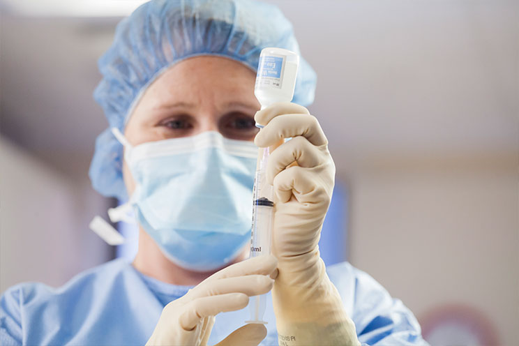 Doctor with syringe 