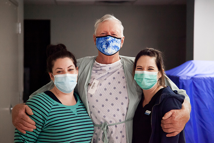 patient and two healthcare team members 