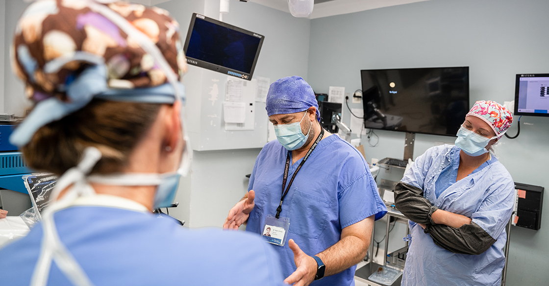 Nurses in scrubs train in the OR