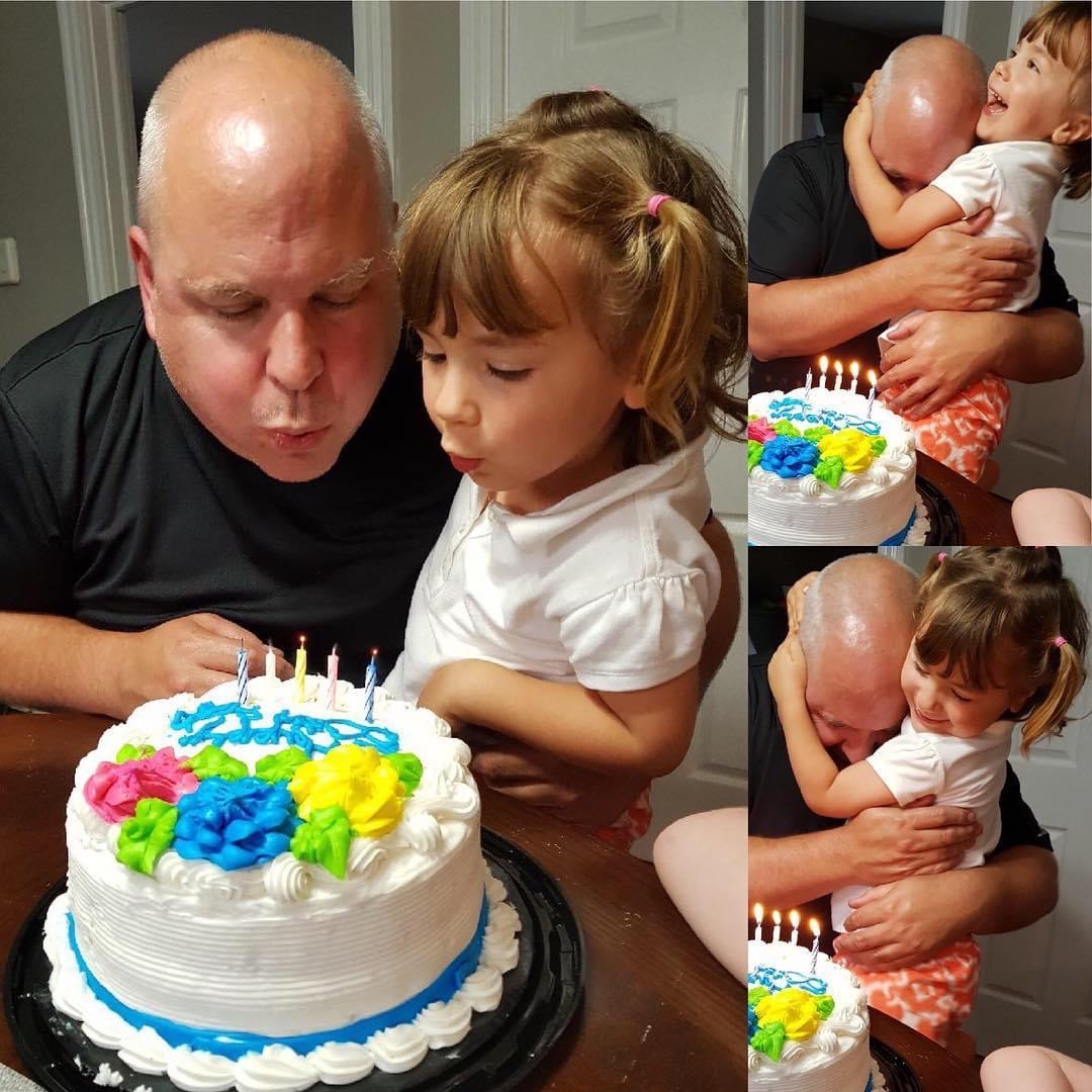 Avery with Rob celebrating a birthday