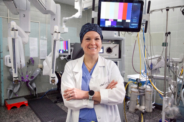 Dr. Scott stands in an operating room