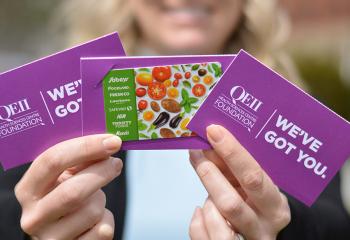 Person holding Sobeys gift cards