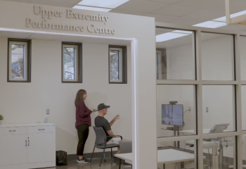 Pictured: Kris Johnston practices tasks to improve coordination and mobility using virtual reality technology in the QEII’s donor-funded Upper Extremity Performance Centre, following a stroke he suffered in winter 2025. 
