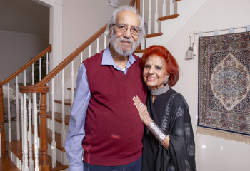The Kanwals stand the entry way of their beautiful home in Dartmouth. 
