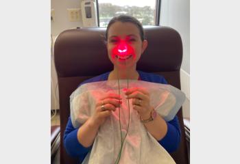 Natasha Breward demonstrates the Steriwave nonthermal red light