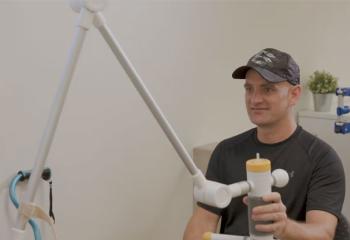 Kris Johnston in the QEII’s Upper Extremity Performance Centre using the virtual reality. 