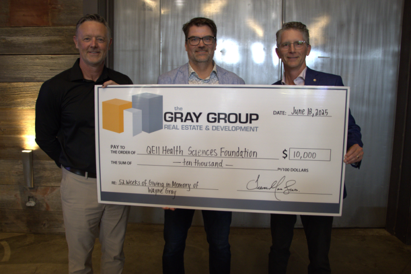Dr. Mark Taylor receives a $10,000 cheque for the CO2 laser from the Gray Group during PEI event. 