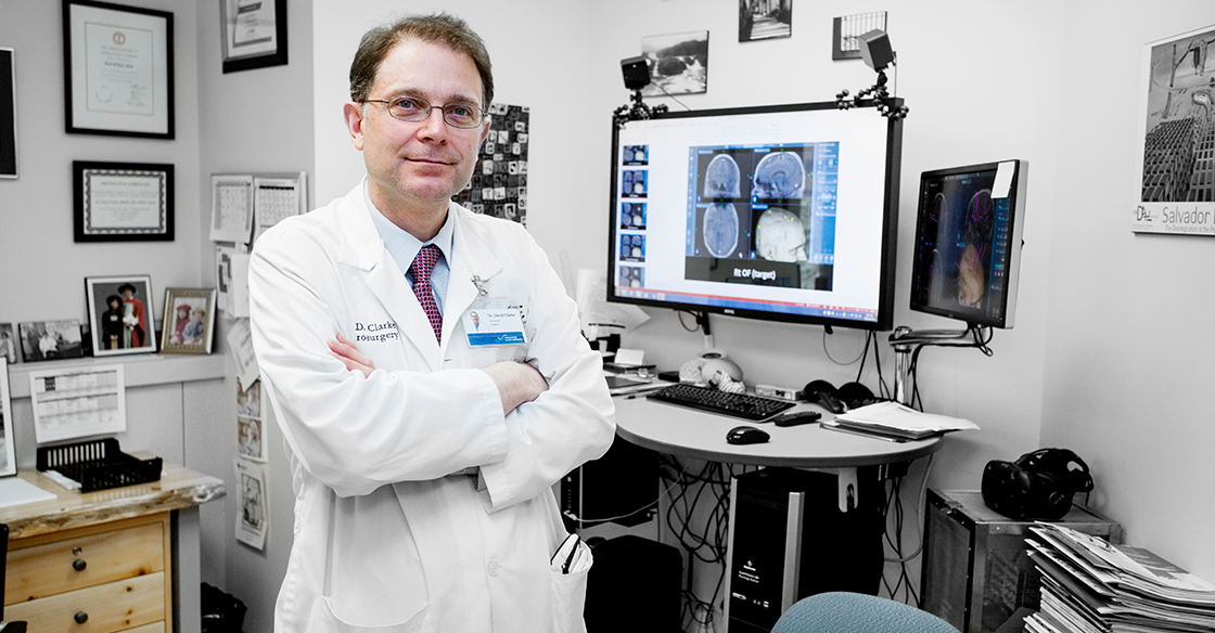Dr. David Clarke, head of the division of neurosurgery at the QEII, stands in front of the StealthStation. This new technology enables neurosurgeons to carry out surgery more effectively, efficiently and in a way which is ultimately safer for the patient.