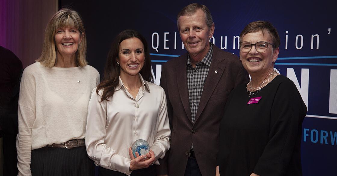 Dr. Jennifer Johnston stands smiling with donors Susan Crocker John Hunkin and Susan Mullin.