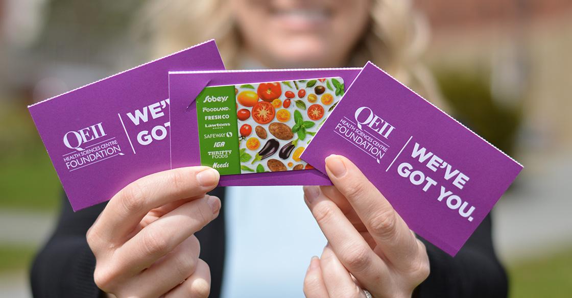 Person holding Sobeys gift cards