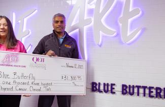 Pictured: Carol Dodds and Dr. Rajaraman present the Blue Butterfly Evening 2025 event total to the QEII Foundation, which raised over $31,300 to support thyroid cancer care in Nova Scotia.