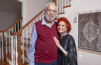 The Kanwals stand the entry way of their beautiful home in Dartmouth. 