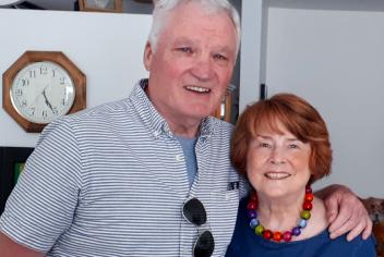 David Cameron and Mary Munson stand together smiling