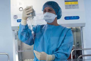 Doctor at the cancer therapy preparation lab